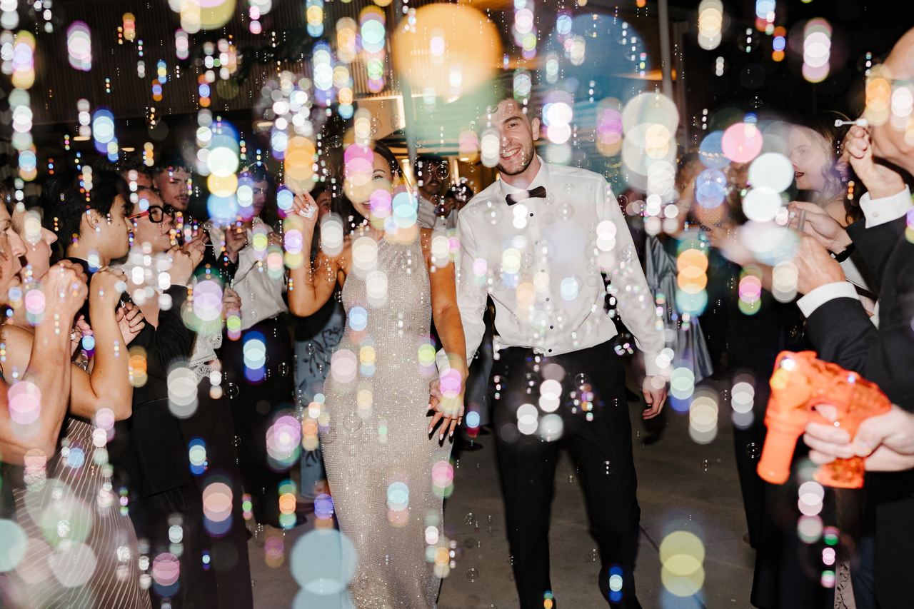Ben and Cameron leaving through a cloud of bubbles