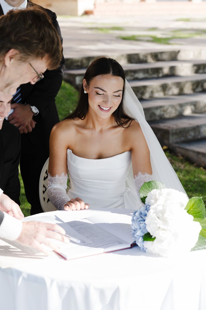 Signing the register, all smiles