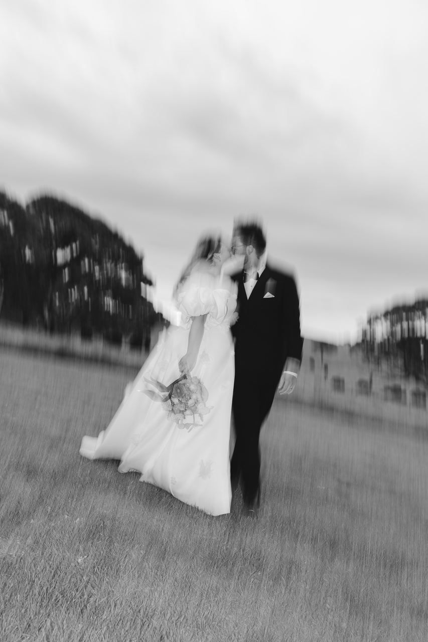 Zak and Zoe walking through the paddock, the world blurring past