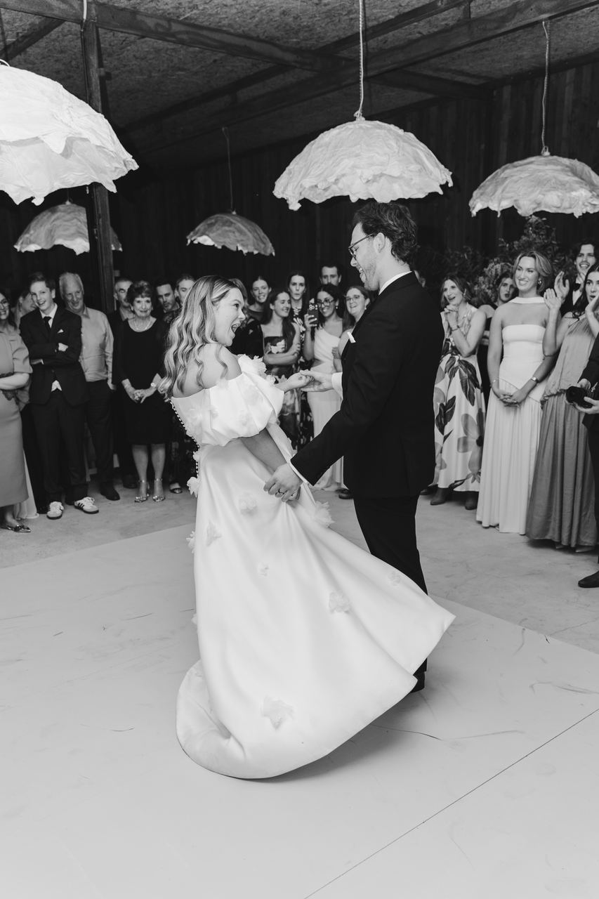 Zak and Zoe's first dance as the guests watch