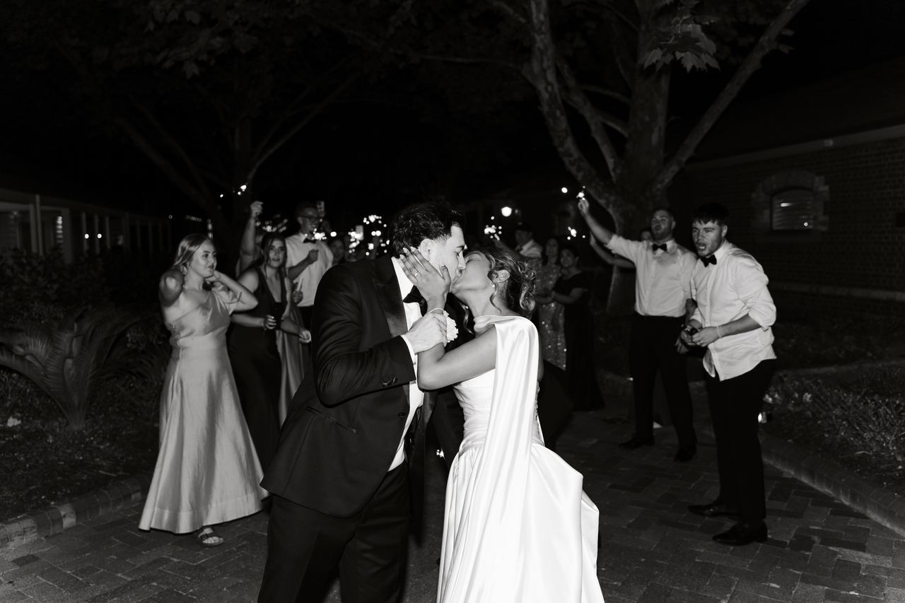 Ben and Sinead dancing with friends at night