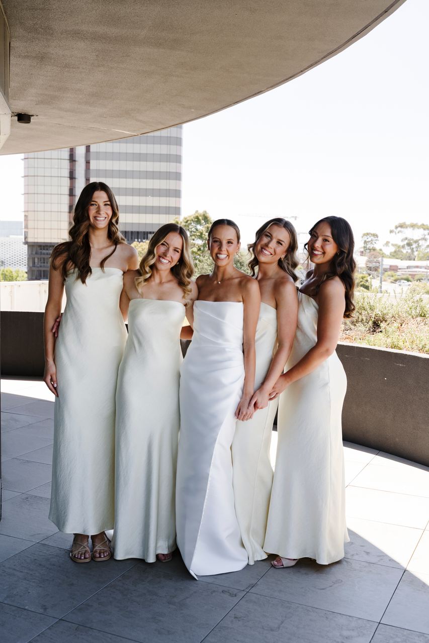 Alex and the bridesmaids on the terrace