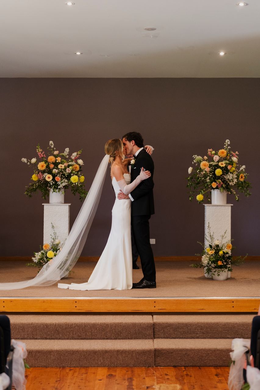Caleb and Georgia's first kiss at the altar
