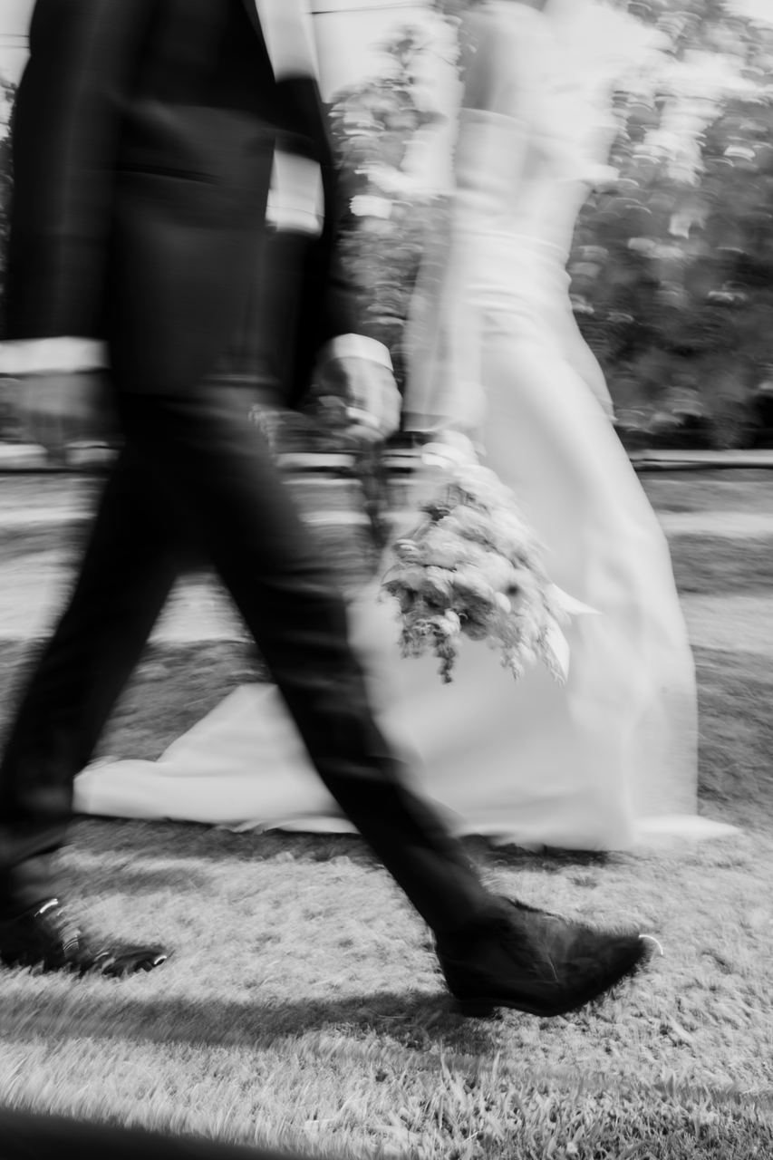 Caleb and Georgia walking hand in hand